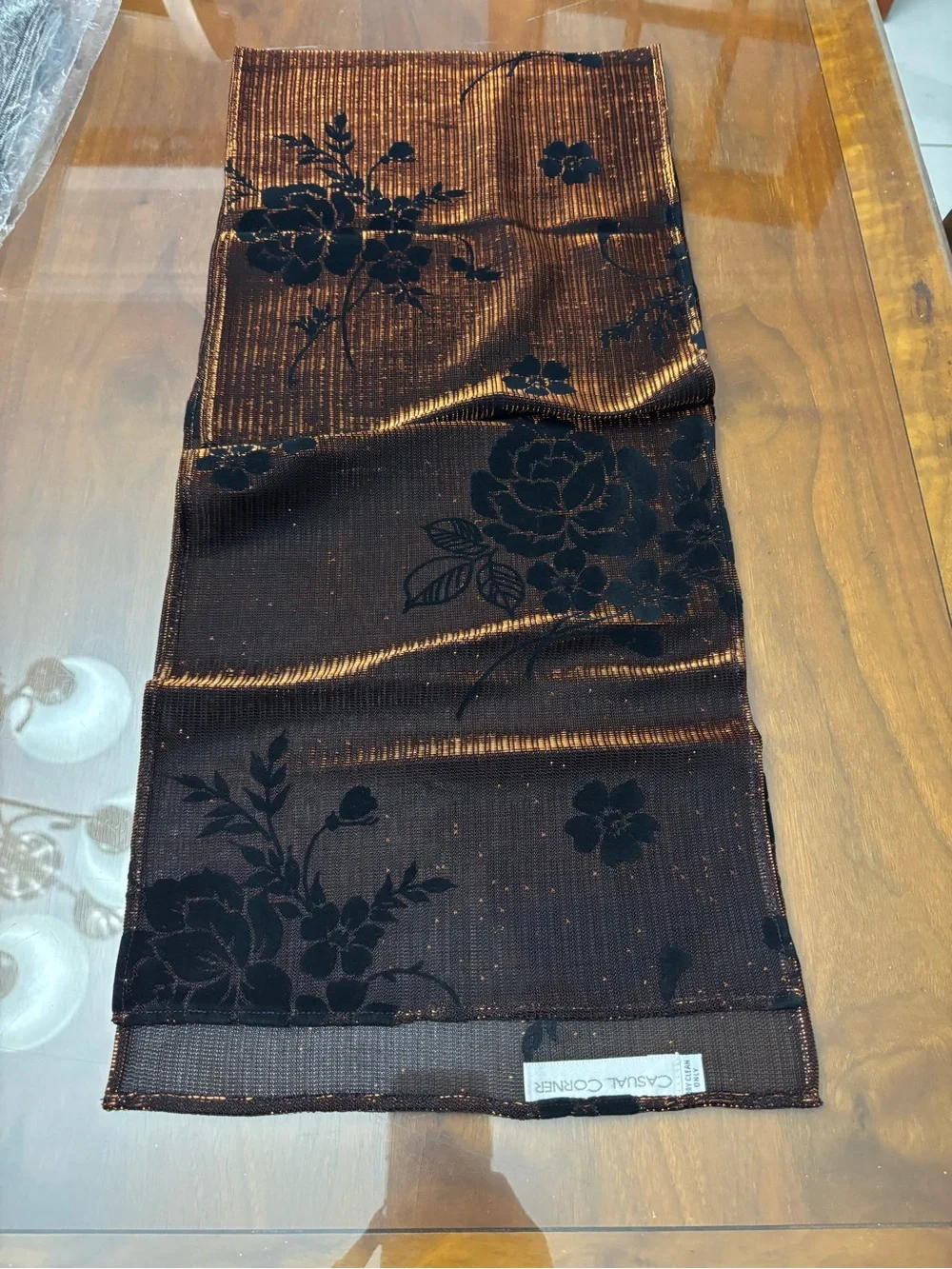 NWOT.  Casual Corner scarf - black with orange metallic threads